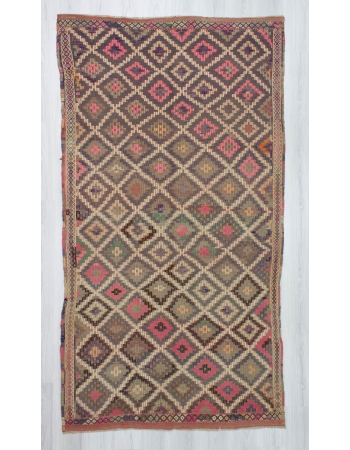 Handwoven vintage pink coloured embroidered Turkish kilim rug