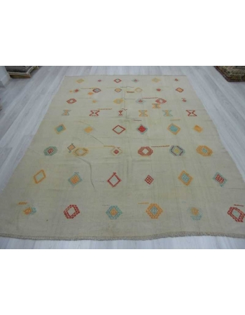 Handwoven vintage embroidered white modern Turkish kilim rug