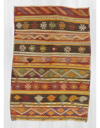 Handwoven vintage embroidered small Turkish kilim rug