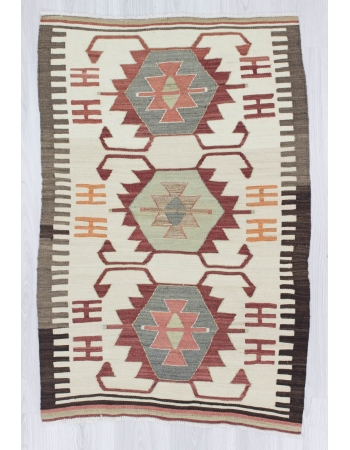 Handwoven vintage decorative small Turkish kilim rug