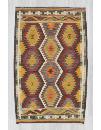 Handwoven vintage small colorful Turkish kilim rug