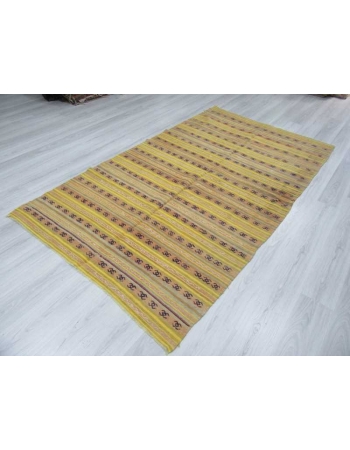 Vintage handwoven yellow striped Turkish kilim rug