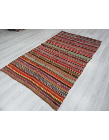 Vintage handwoven vibrant colorful striped Turkish kilim rug