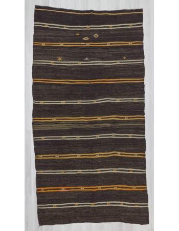 Yellow and white striped black Turkish kilim rug