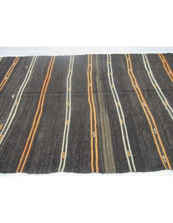 Yellow and white striped black Turkish kilim rug