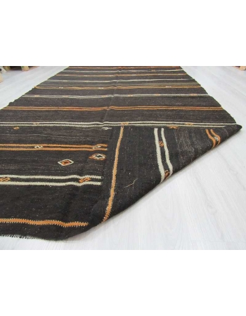 Yellow and white striped black Turkish kilim rug