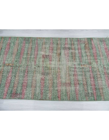 Distressed vintage green ground Turkish art deco rug