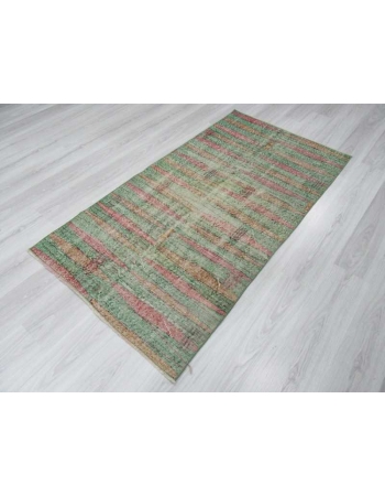 Distressed vintage green ground Turkish art deco rug