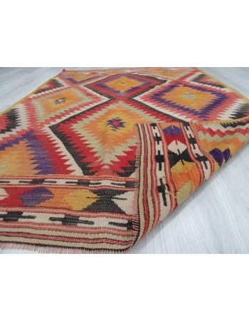 Vintage colorful small Turkish kilim rug