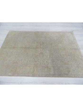 Distressed washed out Turkish rug