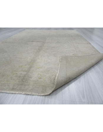 Distressed washed out Turkish rug