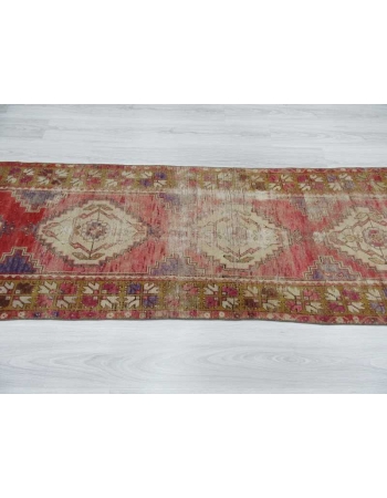 Vintage worn out Turkish runner rug