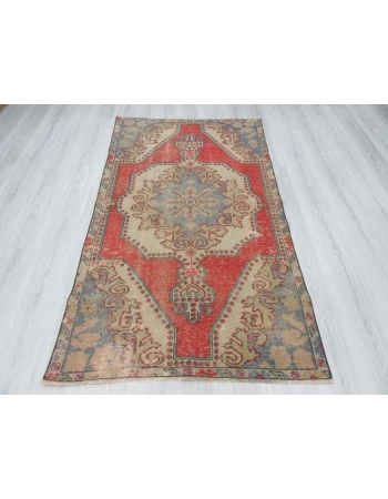 Vintage distressed decorative Turkish rug