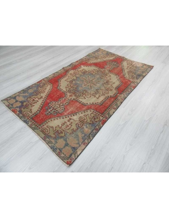 Vintage distressed decorative Turkish rug
