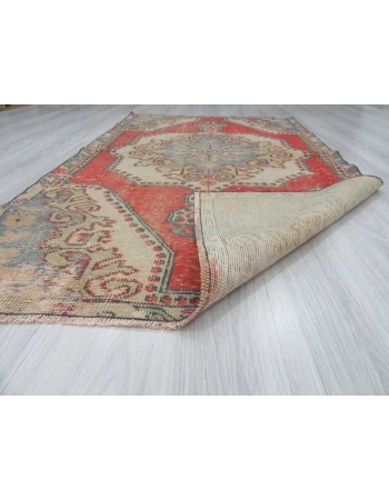 Vintage distressed decorative Turkish rug