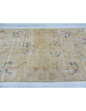 Distressed vintage yellow Turkish deco rug