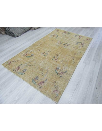 Distressed vintage yellow Turkish deco rug