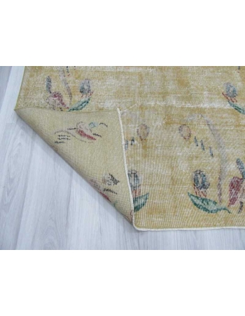 Distressed vintage yellow Turkish deco rug