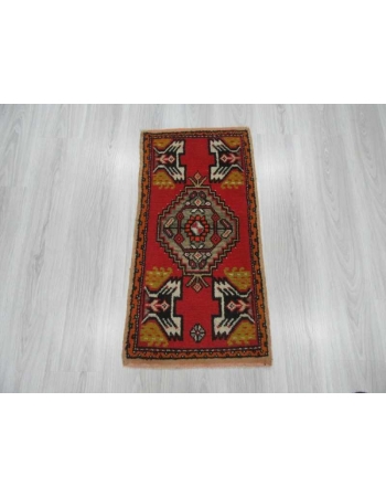 Vintage handknotted mini rug