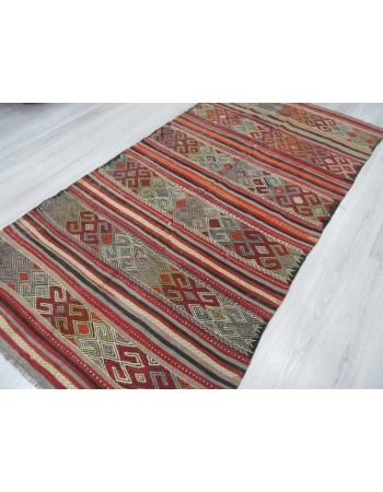 Vintage embroidered kilim rug