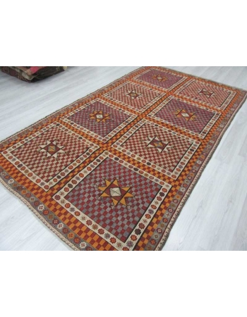 Vintage embroidered Turkish kilim rug