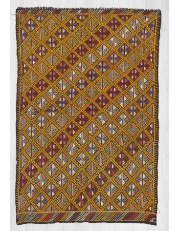 Embroidered vintage Turkish kilim rug