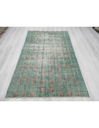 Distressed green Turkish deco rug