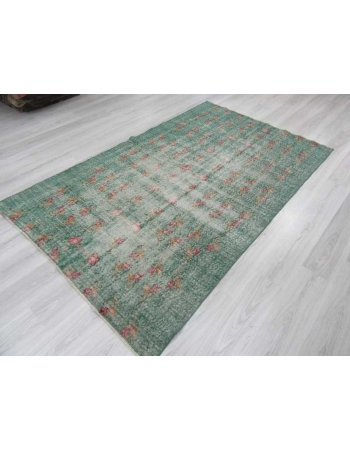 Distressed green Turkish deco rug