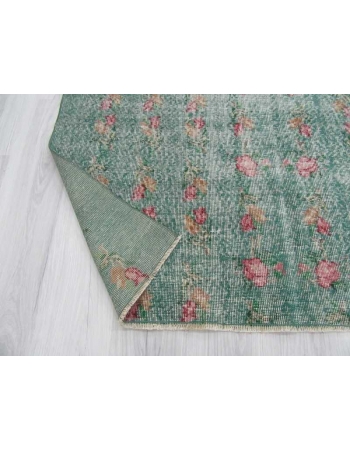 Distressed green Turkish deco rug