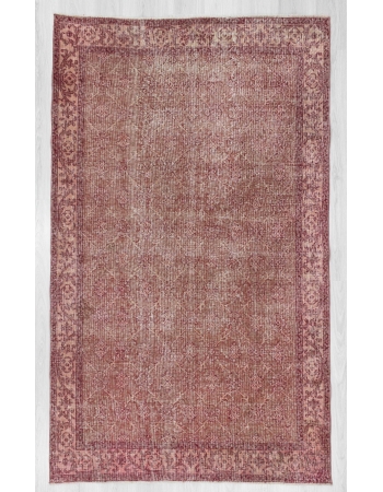 Distressed vintage Turkish rug