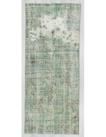 Distressed green Turkish deco rug