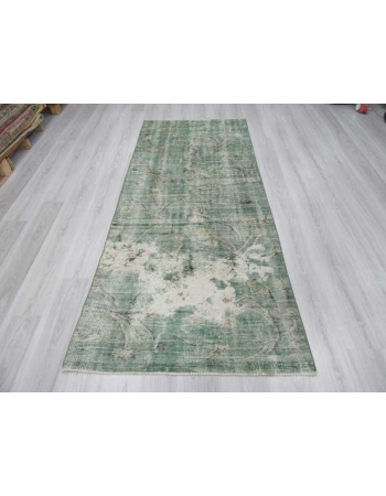 Distressed green Turkish deco rug