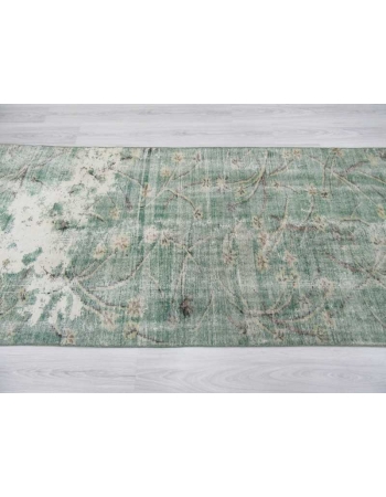 Distressed green Turkish deco rug