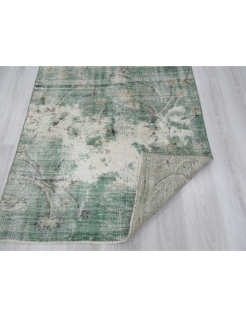 Distressed green Turkish deco rug