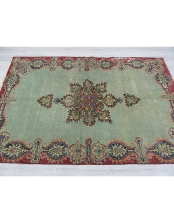 Vintage green distressed Turkish Oushak rug