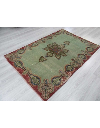 Vintage green distressed Turkish Oushak rug