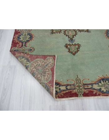 Vintage green distressed Turkish Oushak rug