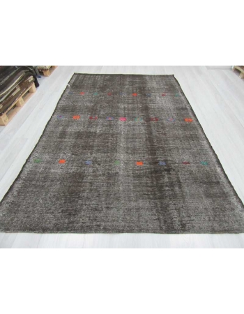 Vintage embroidered black Turkish goat hair kilim rug