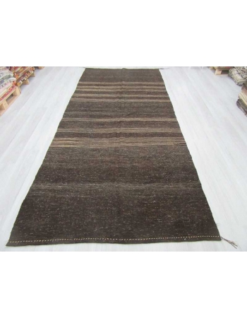 Vintage dark brown kilim rug