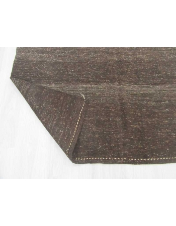 Vintage dark brown kilim rug
