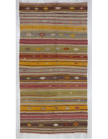 Embroidered colorful vintage kilim rug