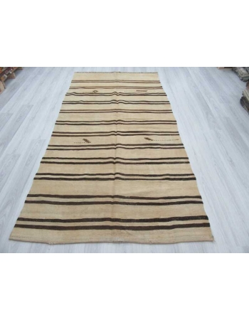 Brown striped vintage natural kilim rug