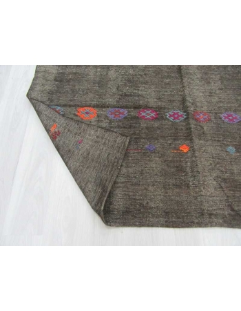 Vintage black embroidered kilim rug