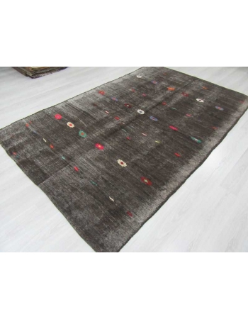 Vintage embroidered black kilim rug