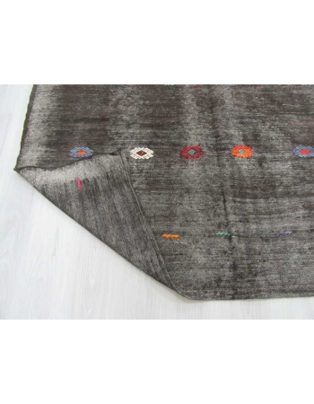 Vintage embroidered black kilim rug