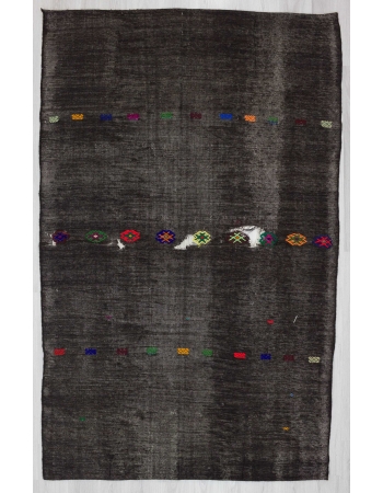 Embroidered vintage black kilim rug