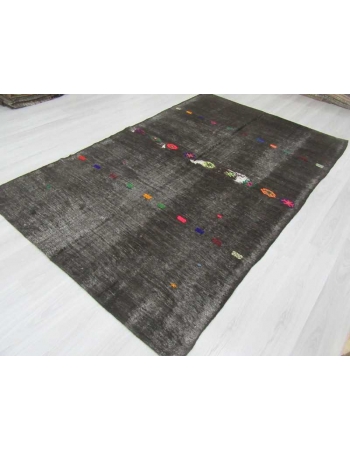 Embroidered vintage black kilim rug