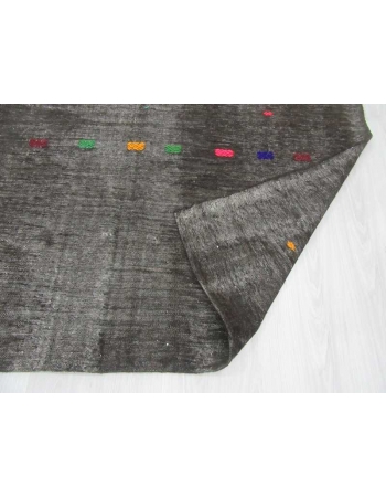 Embroidered vintage black kilim rug