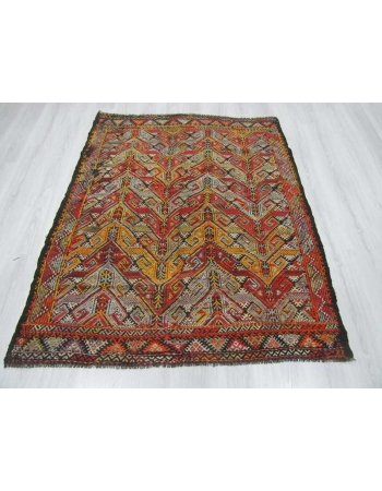 Embroidered vintage kilim rug