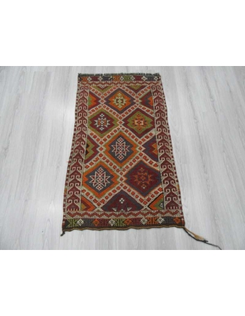 Small Vintage embroidered kilim rug